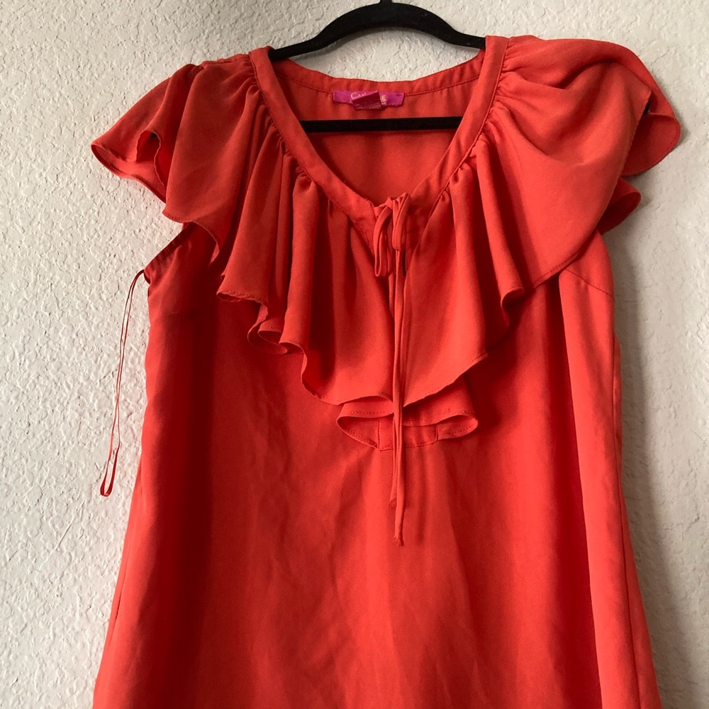 Donated💙5/$25💙 Flattering orange blouse - Picture 2 of 3